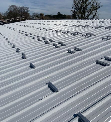 Graphene enhanced metal roof coating