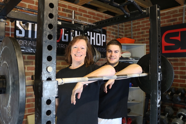 powerlifting with her son 2